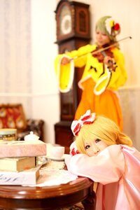 Rating: Safe Score: 0 Tags: 1girl blonde_hair blurry blurry_background blurry_foreground depth_of_field dress hair_ribbon hat multiple_cosplay photo ribbon solo tagme User: admin