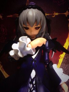 Rating: Safe Score: 0 Tags: 1girl crown doll dress flower frills long_sleeves red_eyes red_flower red_rose rose solo suigintou sword weapon User: admin