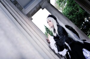 Rating: Safe Score: 0 Tags: 1girl black_dress dress flower frills gothic_lolita hairband lolita_fashion long_hair long_sleeves silver_hair solo standing striped suigintou window wings User: admin
