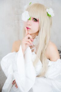 Rating: Safe Score: 0 Tags: 1girl bangs blonde_hair fingernails flower green_eyes hair_ornament kirakishou lips long_hair looking_at_viewer nail_polish realistic solo striped upper_body vertical_stripes User: admin