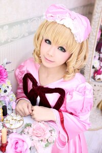 Rating: Safe Score: 0 Tags: 1girl bangs blonde_hair blurry blurry_background blurry_foreground curly_hair depth_of_field floral_print flower green_eyes hinaichigo lips looking_at_viewer nose photo short_hair smile solo User: admin