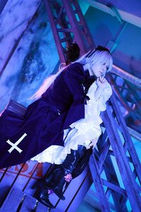 Rating: Safe Score: 0 Tags: 1girl auto_tagged black_dress blurry depth_of_field dress flower frills gothic_lolita indoors long_hair long_sleeves solo standing suigintou User: admin