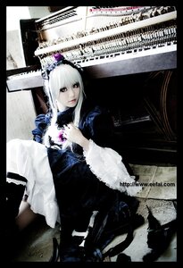 Rating: Safe Score: 0 Tags: 1girl 3d black_dress dress frills lips long_sleeves photo solo suigintou User: admin