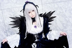 Rating: Safe Score: 0 Tags: 1girl black_dress black_wings cross-laced_clothes detached_collar dress flower frills hairband long_hair long_sleeves looking_at_viewer rose silver_hair skirt_hold solo suigintou wings User: admin