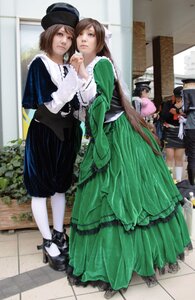 Rating: Safe Score: 0 Tags: 3girls black_hair brown_hair dress green_dress green_eyes hat long_hair multiple_boys multiple_cosplay multiple_girls pantyhose shoes standing tagme white_legwear User: admin