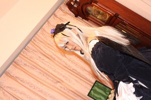 Rating: Safe Score: 0 Tags: 1girl bangs bare_shoulders black_dress blonde_hair book dress gothic_lolita lolita_fashion long_hair long_sleeves solo suigintou User: admin
