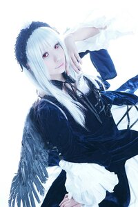 Rating: Safe Score: 0 Tags: 1girl bangs black_wings closed_mouth dress feathers frilled_sleeves frills gothic_lolita hairband lolita_fashion long_hair long_sleeves looking_at_viewer pale_skin red_eyes ribbon simple_background smile solo suigintou white_background white_hair wings User: admin