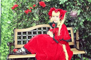 Rating: Safe Score: 0 Tags: 1girl blonde_hair blue_eyes bonnet capelet dress flower long_hair pink_flower plant railing red_capelet red_dress red_flower red_rose rose shinku sitting solo traditional_media User: admin