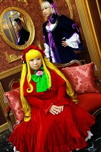 Rating: Safe Score: 0 Tags: 2girls blonde_hair blue_eyes bonnet bow closed_eyes dress flower long_hair long_sleeves multiple_cosplay multiple_girls shinku sitting tagme very_long_hair User: admin