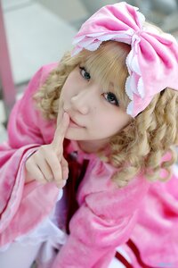Rating: Safe Score: 0 Tags: 1girl artist_name bangs blonde_hair blurry blurry_background blurry_foreground bow closed_mouth curly_hair depth_of_field dress drill_hair hair_bow hinaichigo index_finger_raised lips long_sleeves looking_at_viewer nose photo ribbon smile solo User: admin