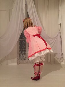 Rating: Safe Score: 0 Tags: 1girl brown_hair curtains dress facing_away full_body high_heels hinaichigo indoors leg_ribbon pink_dress puffy_sleeves red_ribbon ribbon shoes solo standing window User: admin