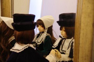 Rating: Safe Score: 0 Tags: 3girls black_headwear brown_hair curtains doll dress hat indoors long_hair long_sleeves mirror multiple_dolls multiple_girls siblings sisters tagme top_hat twins User: admin