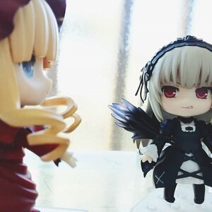 Rating: Safe Score: 0 Tags: 2girls black_dress black_wings blonde_hair blurry depth_of_field doll dress drill_hair frills gothic_lolita hairband lolita_fashion long_hair long_sleeves multiple_dolls multiple_girls photo shinku standing suigintou tagme wings User: admin