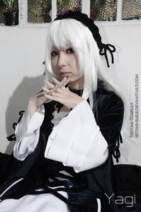 Rating: Safe Score: 0 Tags: 1girl 3d auto_tagged black_dress black_ribbon dress frills gothic_lolita hairband lolita_fashion long_hair long_sleeves looking_at_viewer photo solo suigintou white_hair User: admin