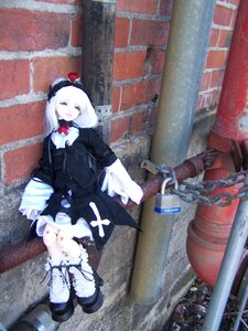 Rating: Safe Score: 0 Tags: 1girl black_dress chain closed_eyes doll dress sitting solo suigintou white_hair User: admin