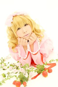 Rating: Safe Score: 0 Tags: 1girl bangs blonde_hair dress drill_hair flower hat hinaichigo lips long_hair long_sleeves rose solo strawberry striped striped_background vertical_stripes User: admin
