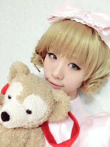 Rating: Safe Score: 0 Tags: 1girl animal bangs blonde_hair closed_mouth hinaichigo lips looking_at_viewer realistic ribbon short_hair smile solo striped upper_body User: admin