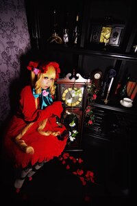 Rating: Safe Score: 0 Tags: 1girl blonde_hair blue_eyes bow clock dress flower hat red_dress shinku sitting solo User: admin