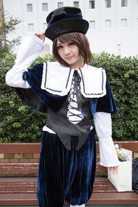 Rating: Safe Score: 0 Tags: 1girl brown_hair building capelet dress hat heterochromia long_sleeves looking_at_viewer outdoors red_eyes short_hair skirt smile solo souseiseki standing swept_bangs top_hat User: admin