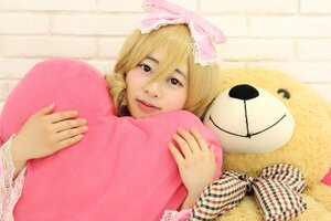 Rating: Safe Score: 0 Tags: 1girl blonde_hair bow frills heart_pillow hinaichigo looking_at_viewer pillow pillow_hug smile solo User: admin