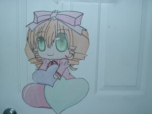 Rating: Safe Score: 0 Tags: 1girl :3 bangs blonde_hair bow closed_mouth dress drill_hair eyebrows_visible_through_hair green_eyes hair_bow hinaichigo image long_sleeves looking_at_viewer photo pink_bow rain short_hair smile solo traditional_media User: admin