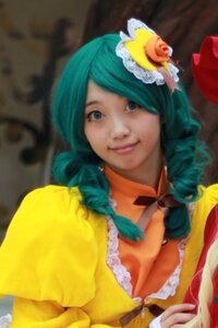 Rating: Safe Score: 0 Tags: 1girl aqua_hair blurry breasts cleavage depth_of_field dress drill_hair flower frills green_hair hair_flower hair_ornament kanaria lips looking_at_viewer nose photo rose smile solo upper_body User: admin