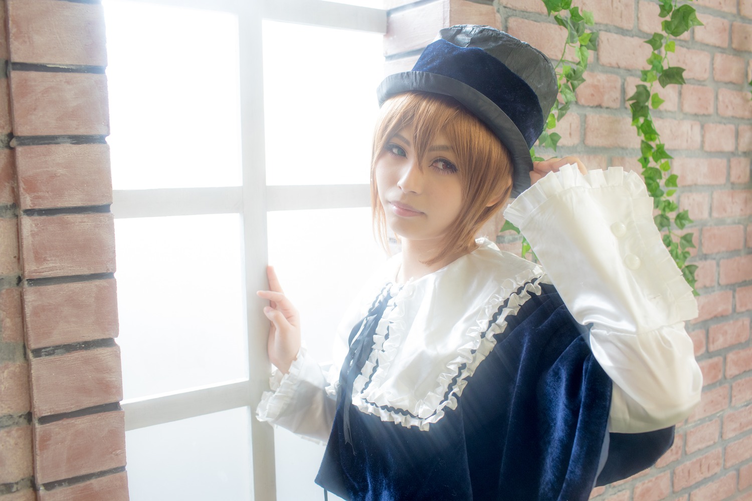 1girl bangs blonde_hair brick_wall dress hat lips long_sleeves looking_at_viewer realistic solo souseiseki upper_body wall window