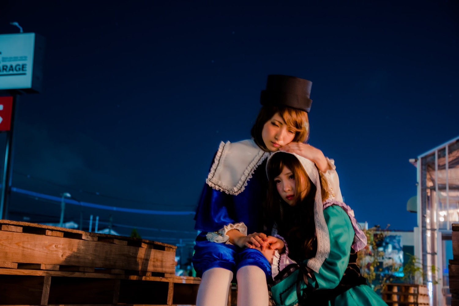 2girls blonde_hair building closed_eyes hat hug lips lipstick makeup multiple_cosplay multiple_girls realistic shorts tagme