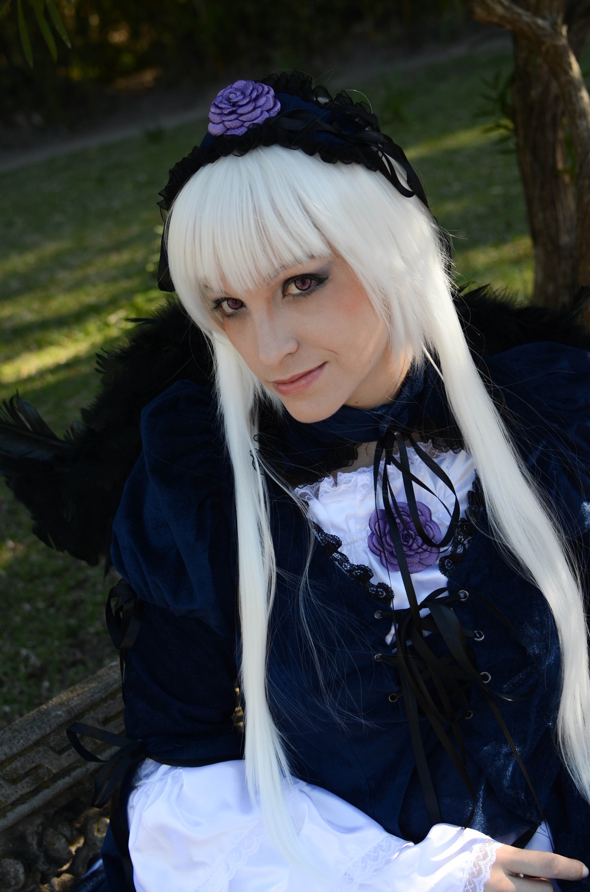 1girl bangs closed_mouth flower forest frills gothic_lolita grass hairband lips lolita_fashion long_hair long_sleeves looking_at_viewer nature realistic rose solo suigintou tree upper_body