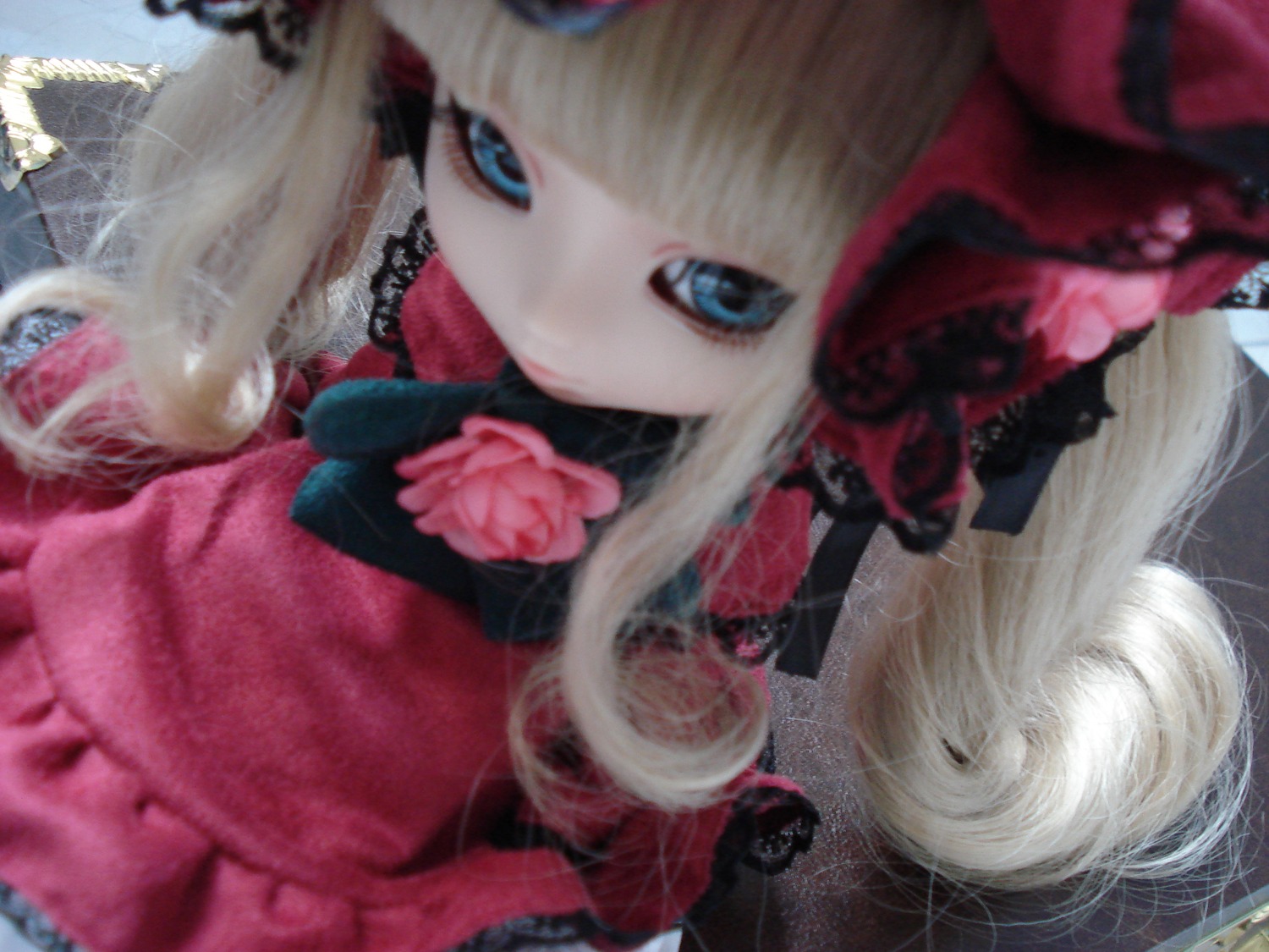 1girl blonde_hair blue_eyes bow doll dress flower hat long_hair looking_at_viewer photo pink_flower red_dress red_flower rose shinku solo