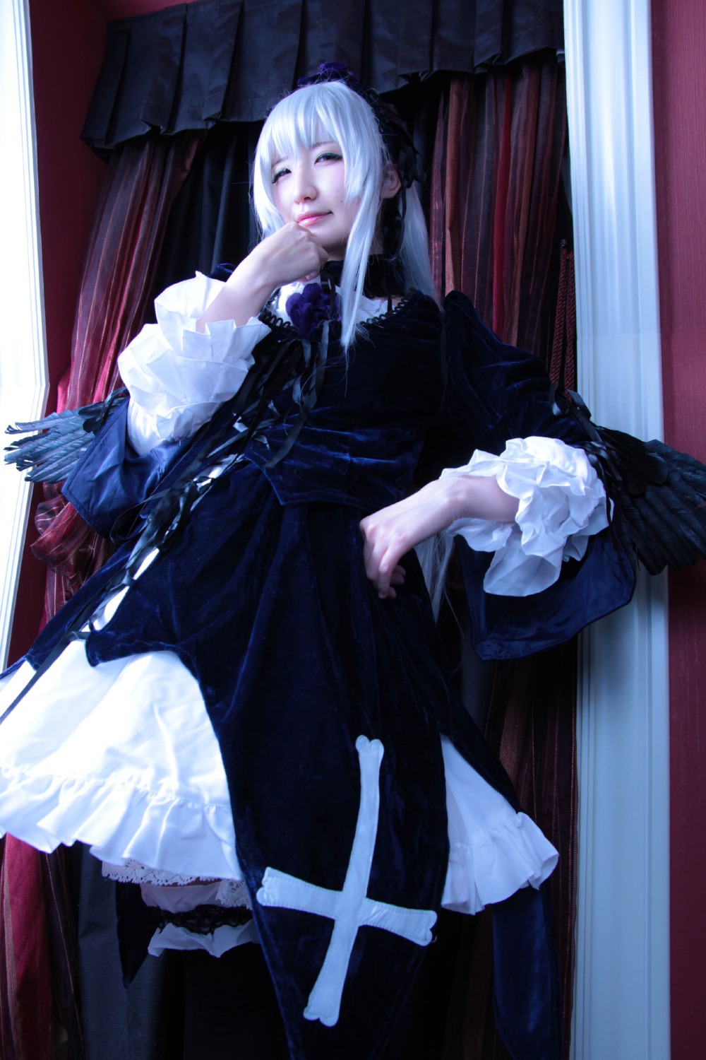1girl bangs black_dress closed_eyes curtains dress frills gothic_lolita indoors lolita_fashion long_hair long_sleeves sitting solo standing suigintou white_hair window wings