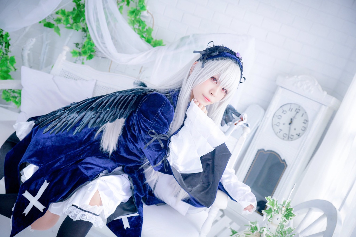 1girl bangs closed_mouth dress flower hairband long_hair long_sleeves looking_at_viewer plant solo suigintou white_hair wings