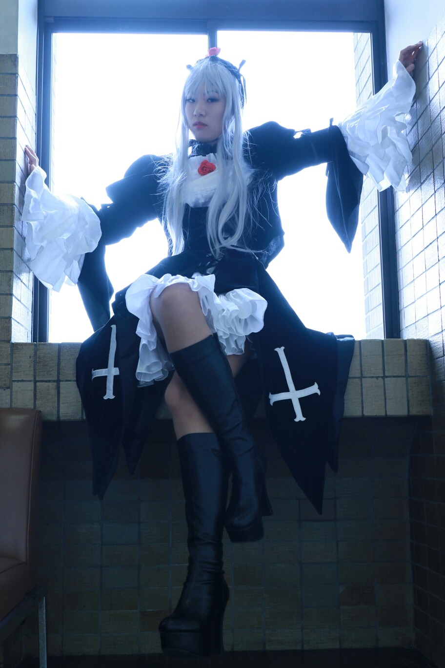 1girl blue_eyes boots dress frills indoors long_hair long_sleeves maid solo suigintou thighhighs window