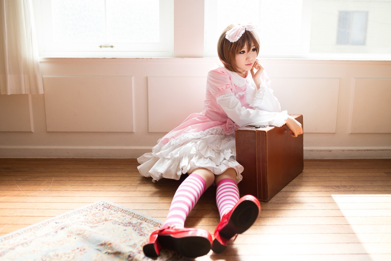 1girl brown_hair dress frills shoes sitting solo souseiseki striped striped_legwear thighhighs