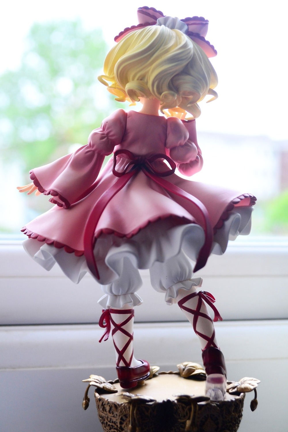 1girl blonde_hair bloomers bow doll dress drill_hair frills hina_ichigo hinaichigo long_sleeves pink_dress puffy_sleeves ribbon short_hair solo underwear