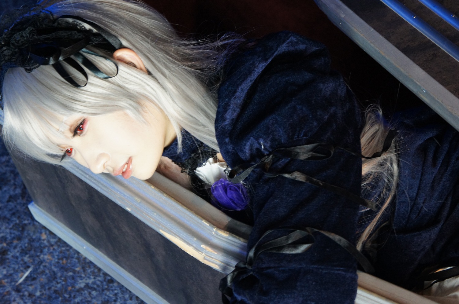 1girl dress flower frills hairband lips long_hair long_sleeves profile red_eyes rose silver_hair solo suigintou