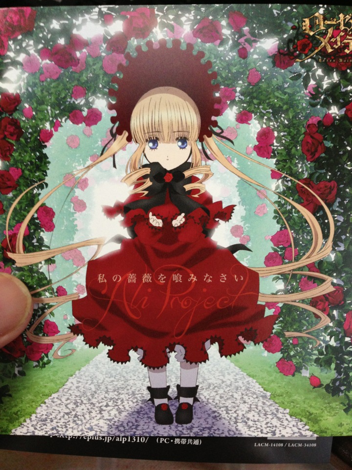 1girl black_ribbon blonde_hair blue_eyes bow bowtie capelet dress flower full_body hair_ribbon image long_hair looking_at_viewer red_capelet red_dress red_flower red_rose rose shinku shoes solo twintails very_long_hair