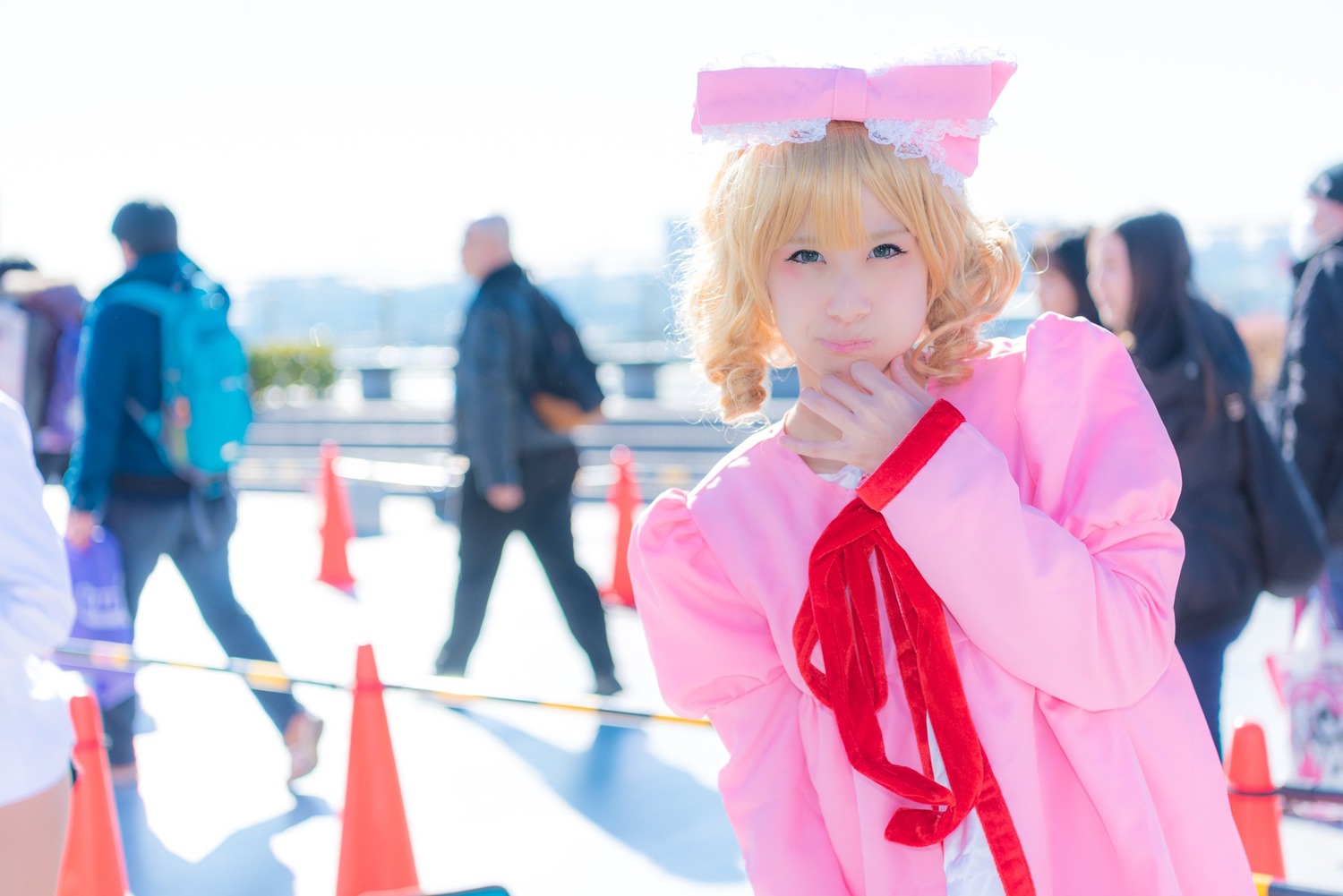blonde_hair blurry blurry_background blurry_foreground depth_of_field dress hat hinaichigo long_sleeves multiple_boys ribbon short_hair solo