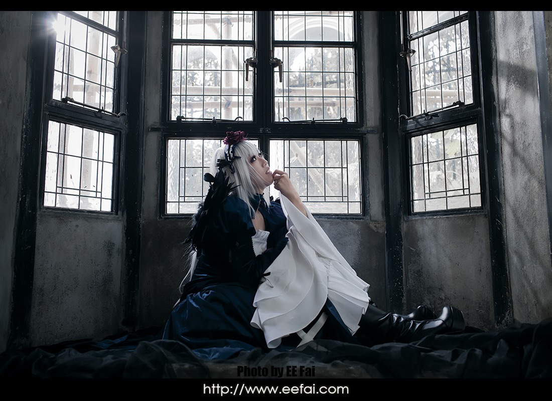 1girl black_border dress flower gloves hair_ornament hat indoors letterboxed long_hair long_sleeves silver_hair sitting solo suigintou white_gloves window