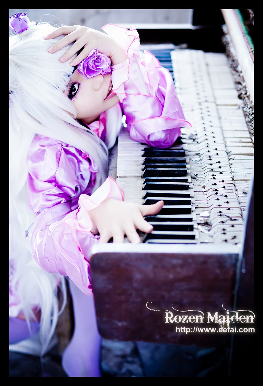 1girl barasuishou black_border blurry copyright_name depth_of_field dress flower frills instrument letterboxed long_hair music piano playing_instrument plectrum purple_eyes rose sheet_music solo white_hair