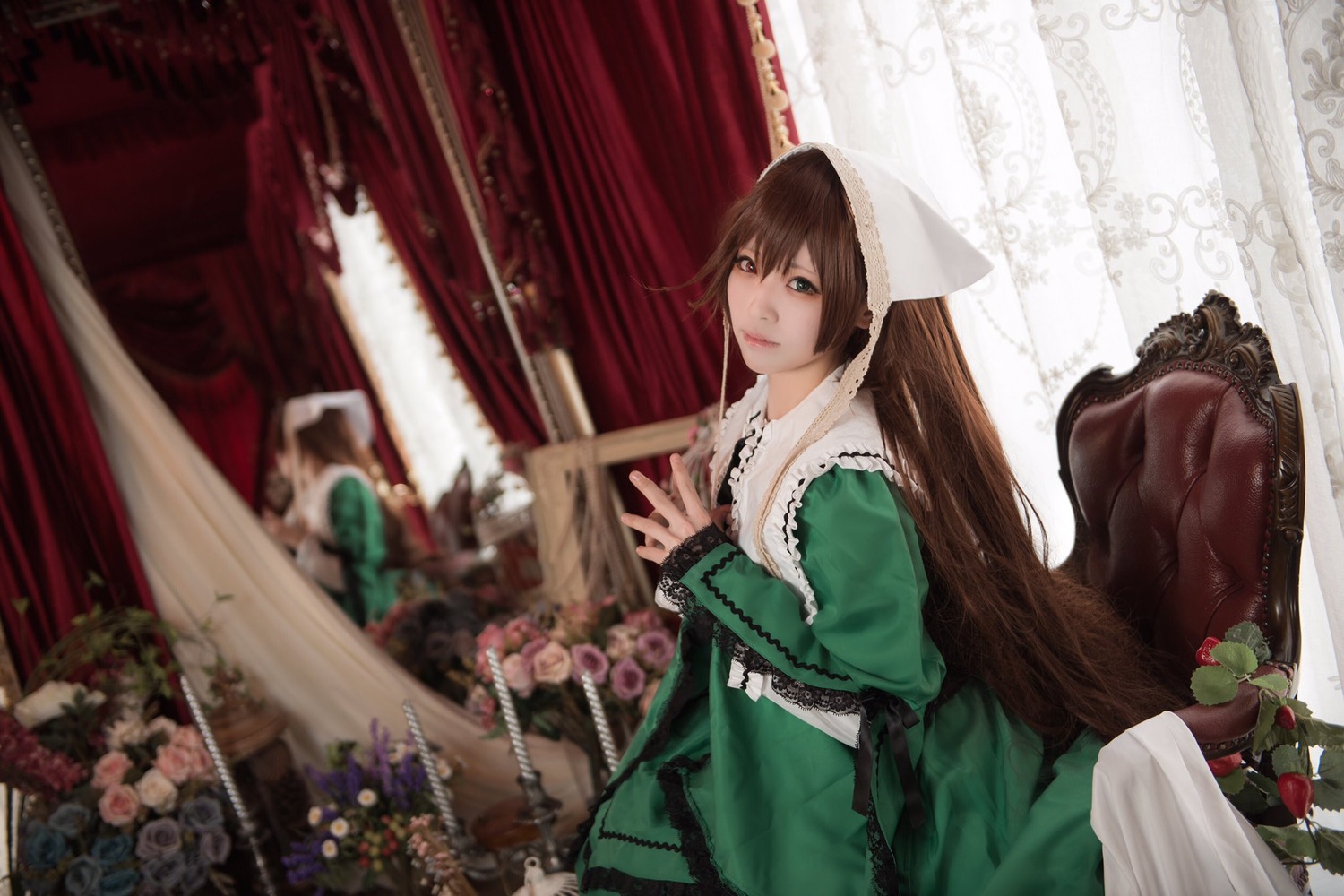 1girl brown_hair curtains dress flower green_dress green_eyes indoors long_hair long_sleeves looking_at_viewer solo suiseiseki very_long_hair window