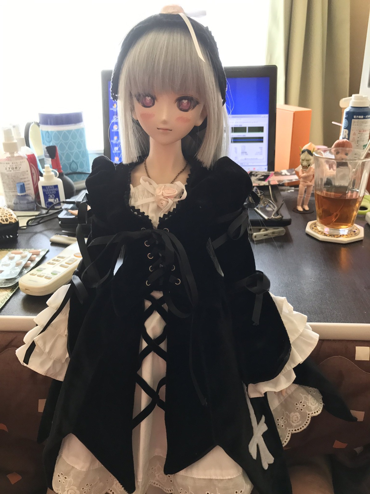 1girl black_dress blonde_hair doll dress indoors long_hair solo suigintou