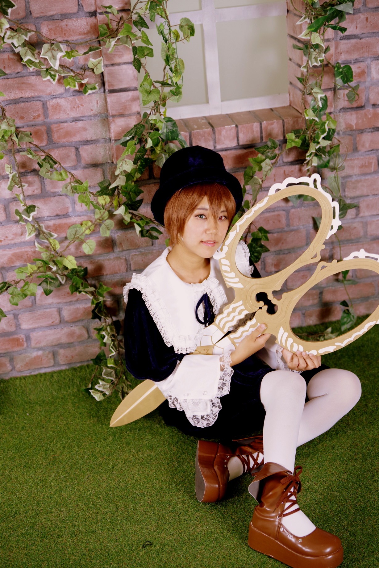 1girl beret brick brick_wall brown_footwear brown_hair dress hat ivy lips pantyhose plant potted_plant shoes short_hair sitting solo souseiseki vines white_legwear