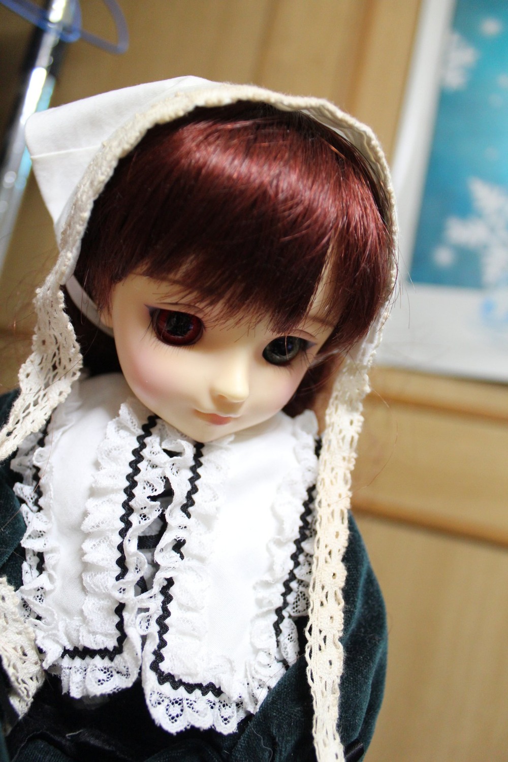1girl 3d bangs blurry blurry_background blurry_foreground brown_hair building depth_of_field doll dress frills indoors lace looking_at_viewer photo smile solo suiseiseki