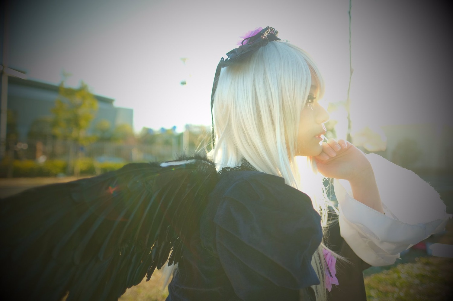 1girl black_dress blurry dress juliet_sleeves lips long_sleeves photo profile puffy_sleeves short_hair solo suigintou upper_body white_hair