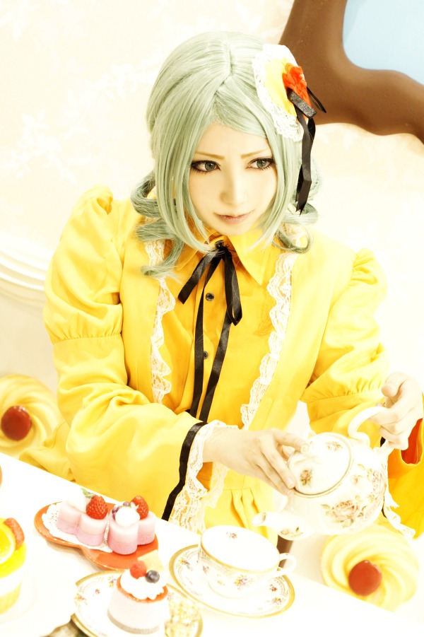 1girl cake dessert dress flower food fork fruit hair_ornament kanaria pastry plate ribbon solo strawberry tea teacup white_hair yellow_dress