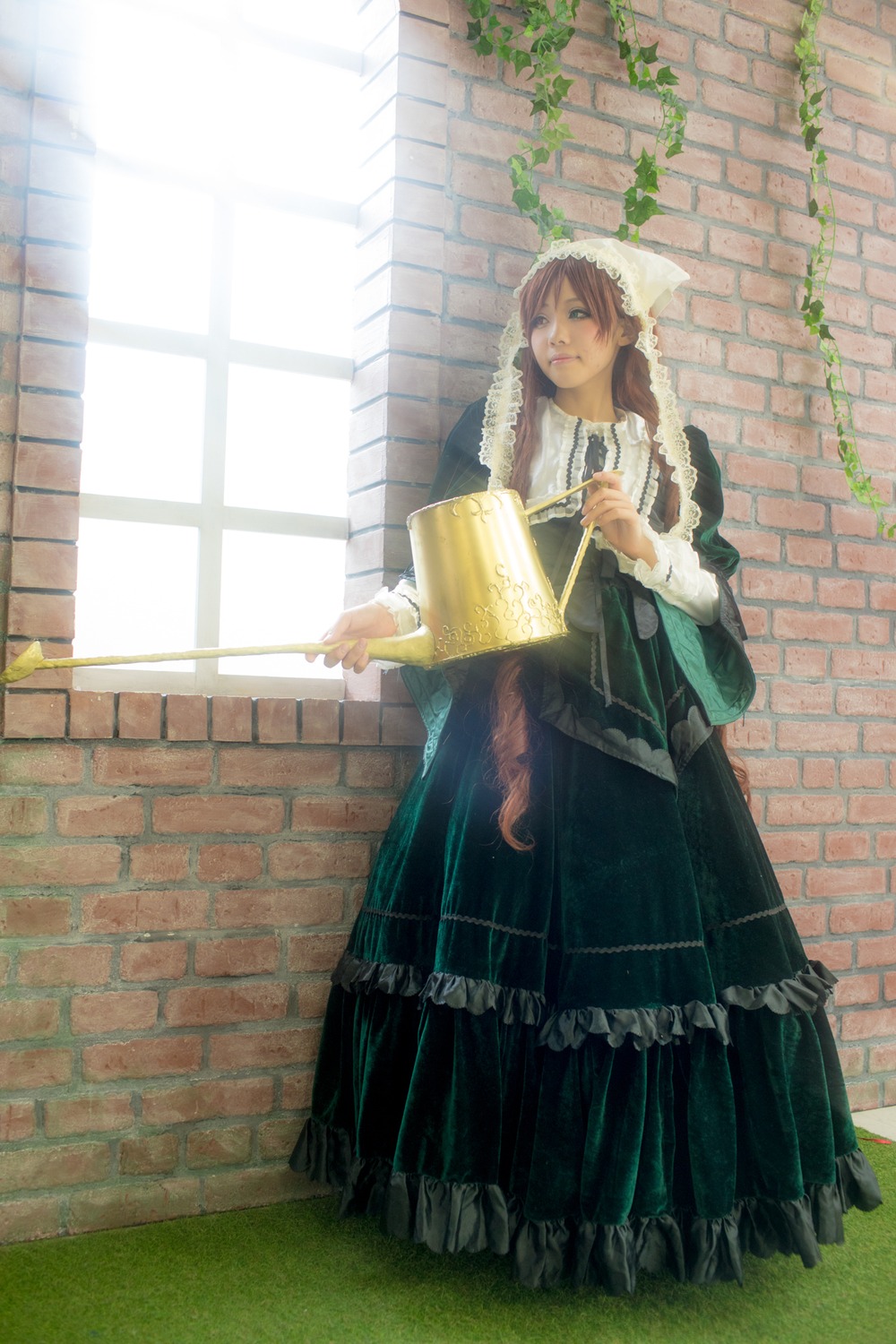 1girl apron black_dress brick_wall brown_hair dress frills long_sleeves maid solo standing suiseiseki window