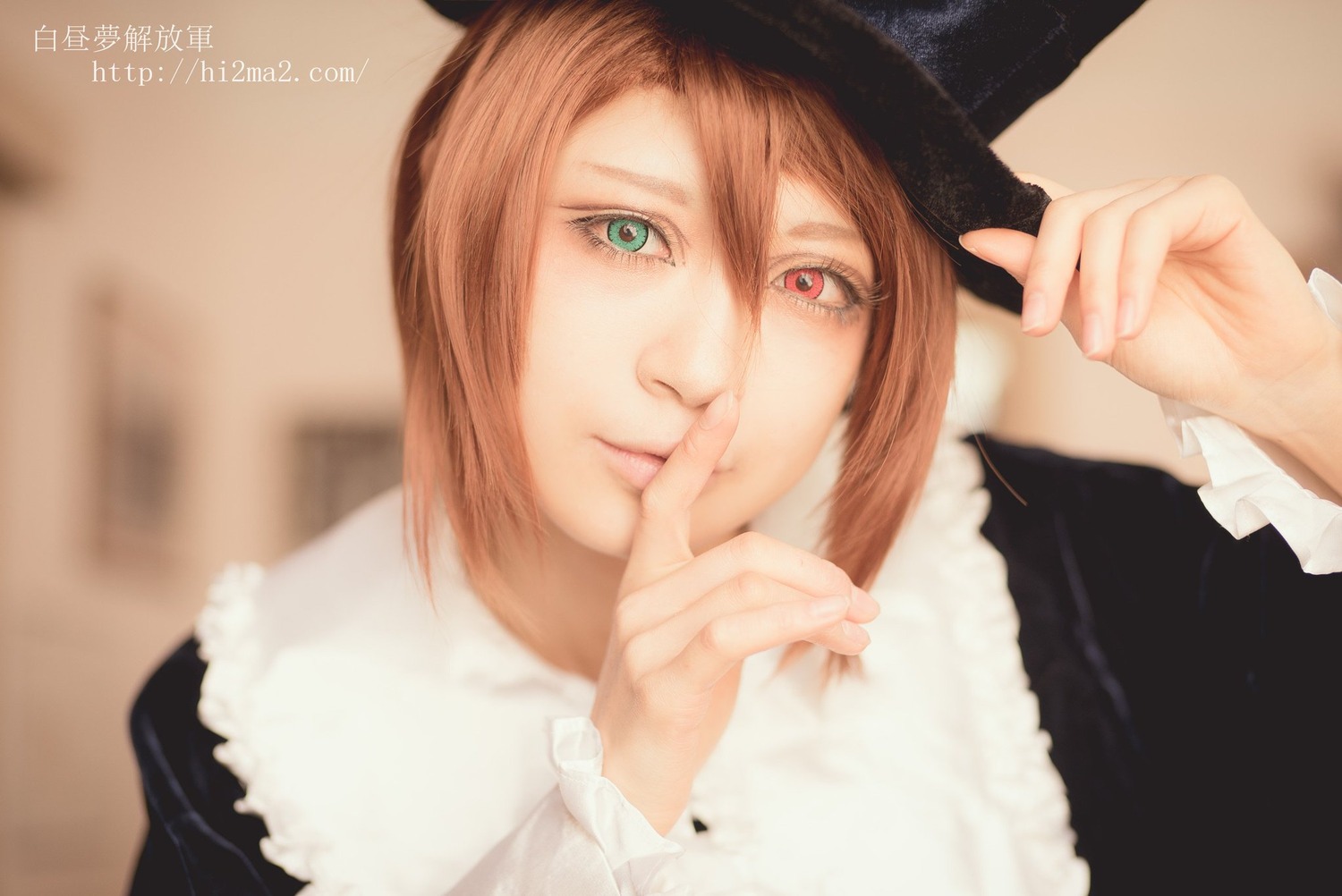 1girl black_headwear blurry closed_mouth depth_of_field green_eyes hair_between_eyes hat lips long_sleeves looking_at_viewer short_hair solo souseiseki watermark