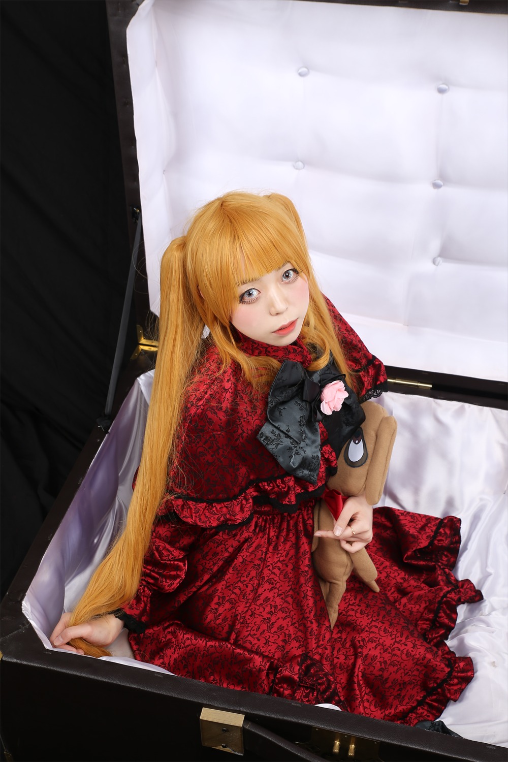 1girl blonde_hair dress long_hair red_dress shinku solo stuffed_animal teddy_bear twintails