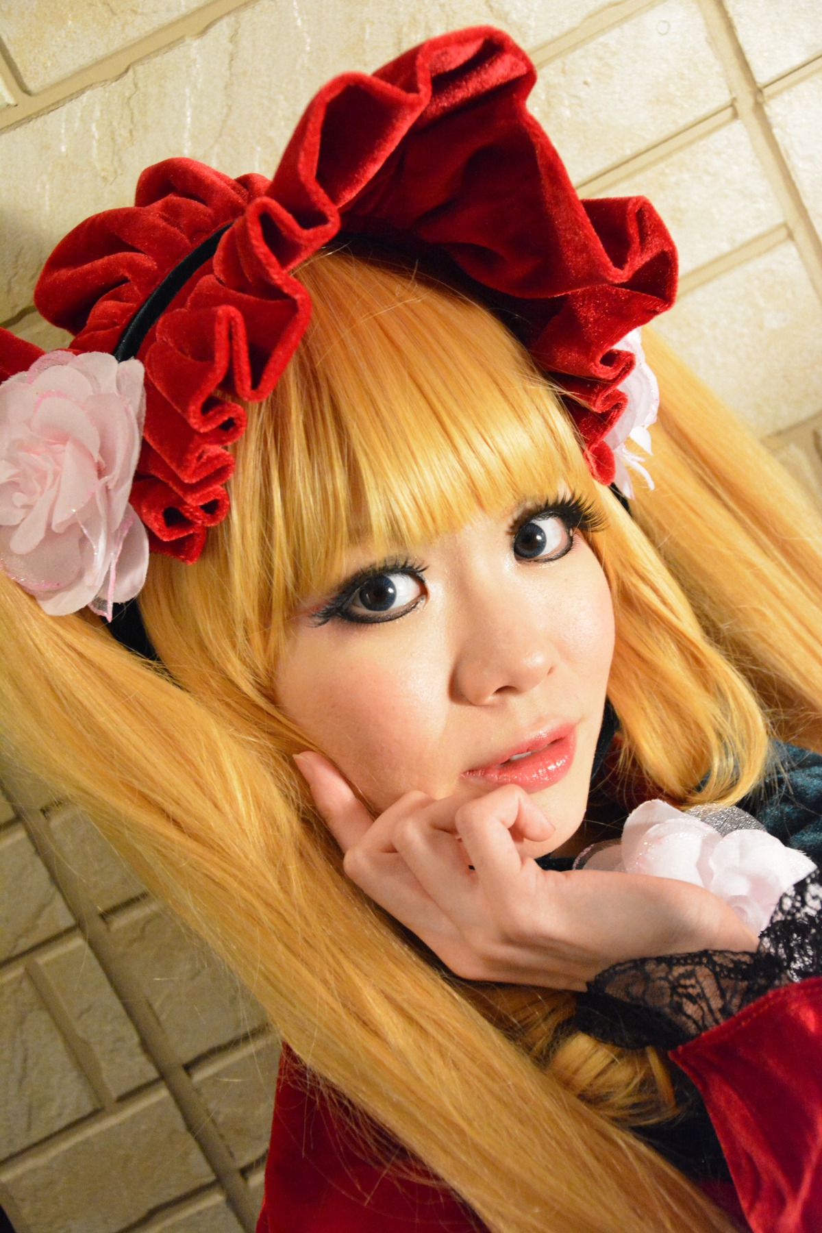 1girl bangs blonde_hair brick_wall eyelashes flower hat lips long_hair looking_at_viewer portrait realistic red_flower red_rose rose shinku solo